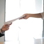 Photo by Andrea Piacquadio from Pexels: https://www.pexels.com/photo/job-applicant-passing-her-documents-3760072/