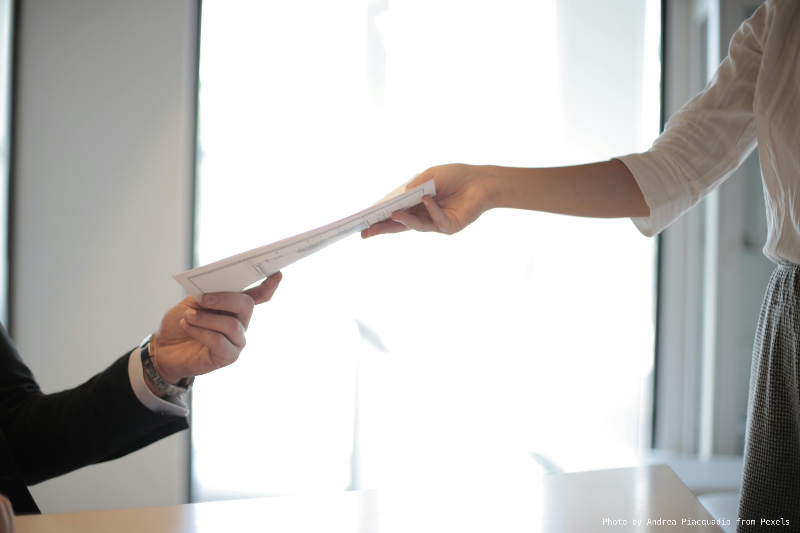 Photo by Andrea Piacquadio from Pexels: https://www.pexels.com/photo/job-applicant-passing-her-documents-3760072/