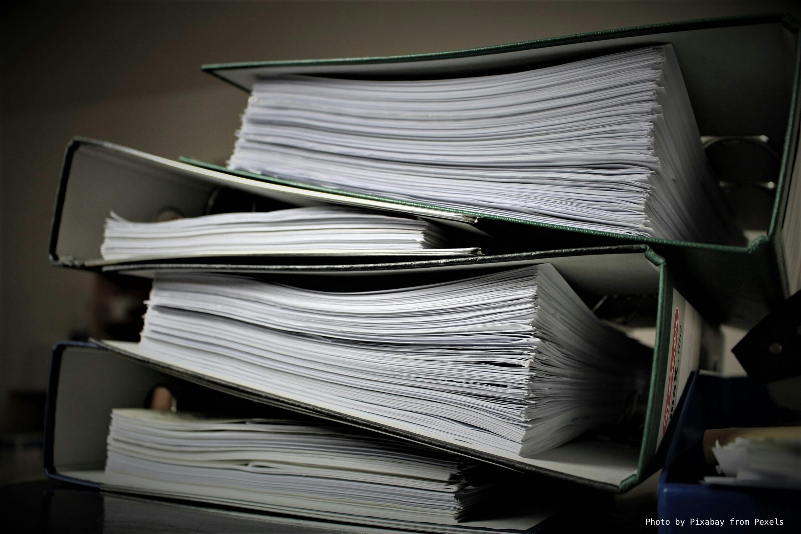 Photo by Pixabay from Pexels: https://www.pexels.com/photo/pile-of-folders-357514/